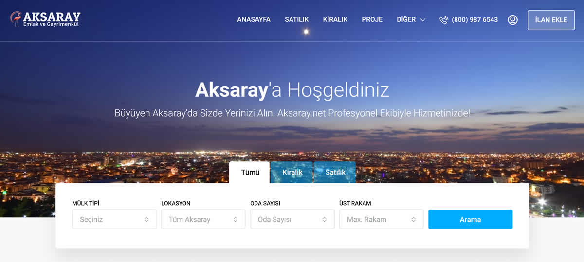 aksaray.net giriş ekranı: gece çekilmiş Aksaray şehir fotoğrafı üzerinde “Aksaray'a Hoşgeldiniz” başlığı ve Tümü, Kiralık, Satılık sekmeli; mülk tipi, lokasyon, oda sayısı ve üst rakam alanları olan arama formu